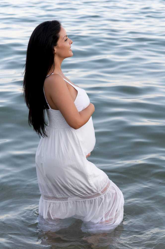 Navigating Pregnancy Serenity: Safety Tips Amidst Ocean Waves Hitting Pregnant Belly